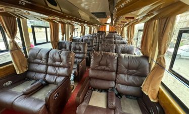 Travel in comfort with our spacious and cozy sofa bus, designed for a relaxing journey.